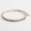 Tammen Koru -rannekoru • Caratia