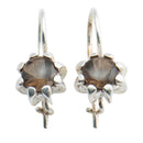 Kalevala Koru Naisen ääni -korvakorut • Caratia