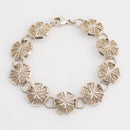 Lumoava-rannekoru • Caratia