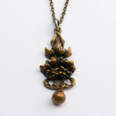 KIM | Pronssi - Riipukset ja kaulakorut - Caratia | Caratia