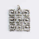 KIM | Hopea - Riipukset ja kaulakorut - Caratia | Caratia