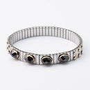 Nomination Extension Collection mustilla kivillä • Caratia