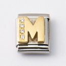 Nomination M-kirjain kivillä • Caratia