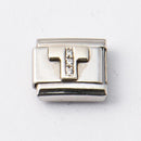 Nomination T-kirjain kivillä • Caratia