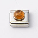 Nomination Oranssi kivi • Caratia