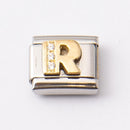 Nomination R-kirjain kivillä • Caratia