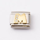 Nomination M-kirjain kivillä • Caratia