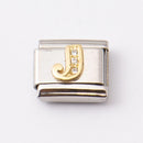 Nomination J-kirjain kivillä • Caratia