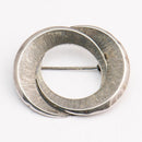 Koruteollisuus Tillander Oy -rintakoru • Caratia