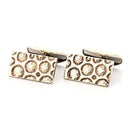 Martti Viikinniemi kalvosinnapit • Caratia