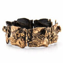 Pronssinen rannekoru • Caratia